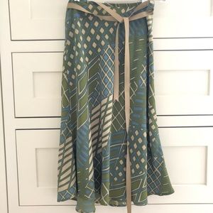 Poleci midi skirt with ribbon tie.